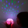 roosa ükssarviku öölamp projektor tähed